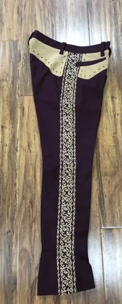 PANTALONES DE CHARRO. AUTHENTIC CHARRO PANTS THAT ARE DARK WINE WITH LIGHT BROWN SUEDE LEATHER STITCHED STENCIL ART WORK -HerraduraDeOro image da8b4f68 1742 486b 9f9e de099359972b